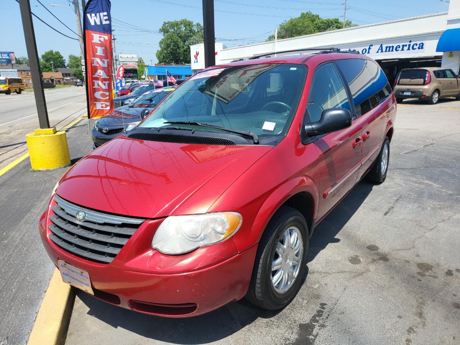 2006 Red Chrysler Town and Country (2A8GP54L26R) with an V6 3.8 Liter engine, Automatic transmission, located at 2105 Dixie Hwy, Louisville, KY, 40210, (502) 772-3333, 38.221058, -85.792671 - Photo #0