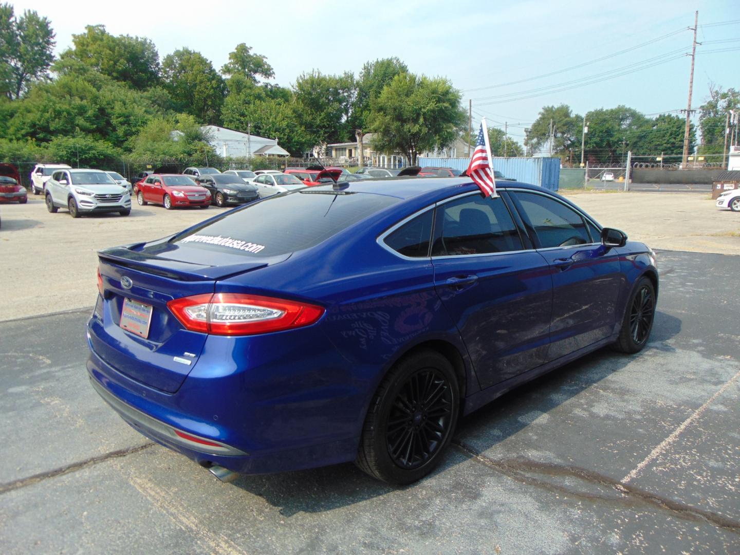 2014 Ford Fusion (3FA6P0HD4ER) , located at 2105 Dixie Hwy, Louisville, KY, 40210, (502) 772-3333, 38.220932, -85.795441 - Photo#4