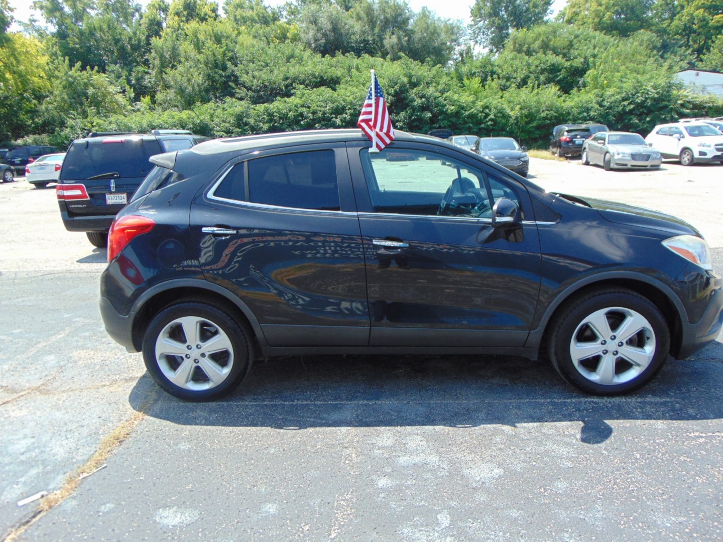 2015 Black Buick Encore (KL4CJESB4FB) with an 4-Cyl, ECOTEC, 1.4T engine, Automatic, 6-Spd w/Overdrive transmission, located at 2105 Dixie Hwy, Louisville, KY, 40210, (502) 772-3333, 38.220932, -85.795441- Photo#2