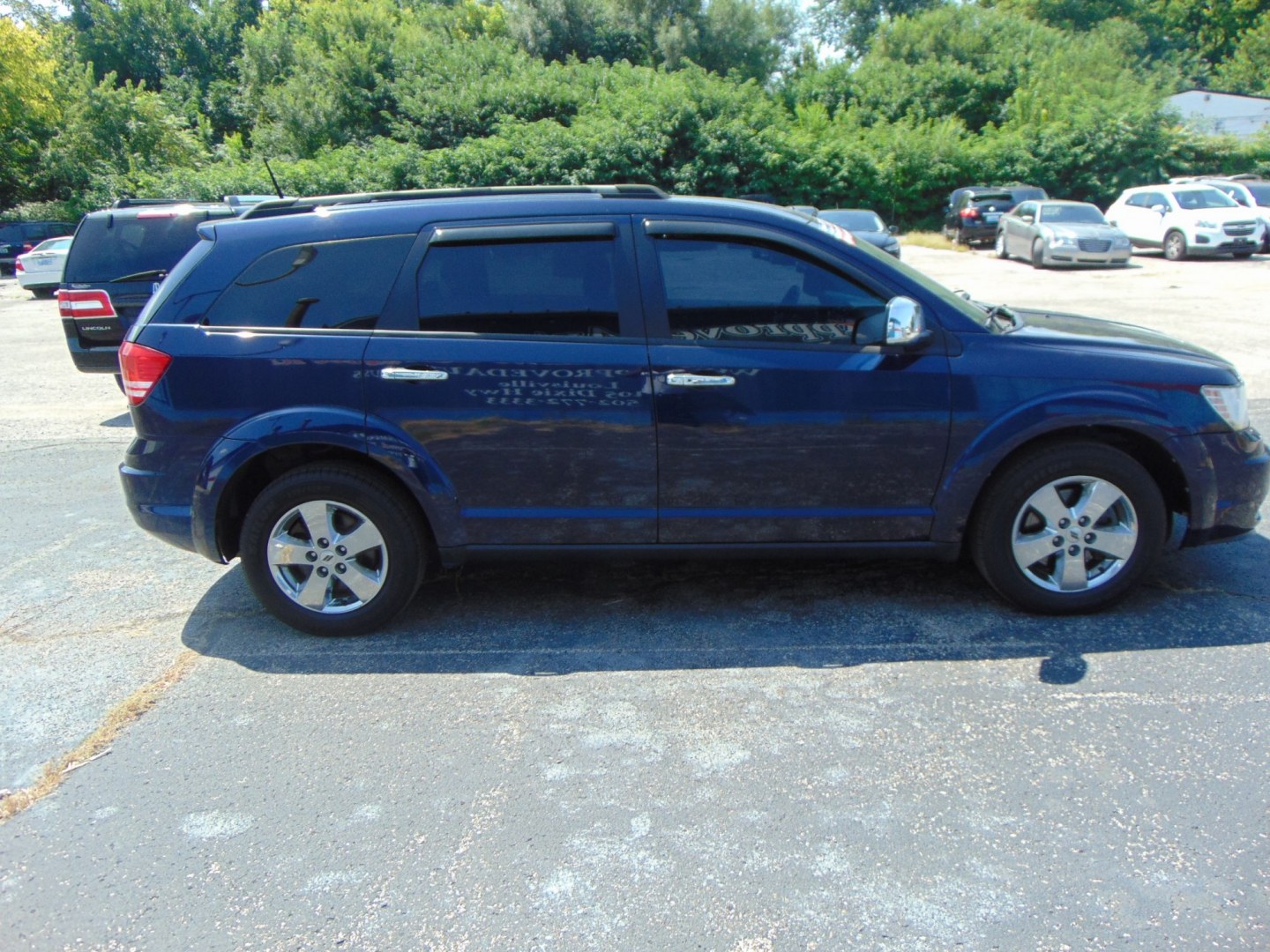 2018 Blue Dodge Journey (3C4PDCAB6JT) with an 4-Cyl, 2.4 Liter engine, Automatic, 4-Spd w/AutoStick transmission, located at 2105 Dixie Hwy, Louisville, KY, 40210, (502) 772-3333, 38.220932, -85.795441- Photo#4