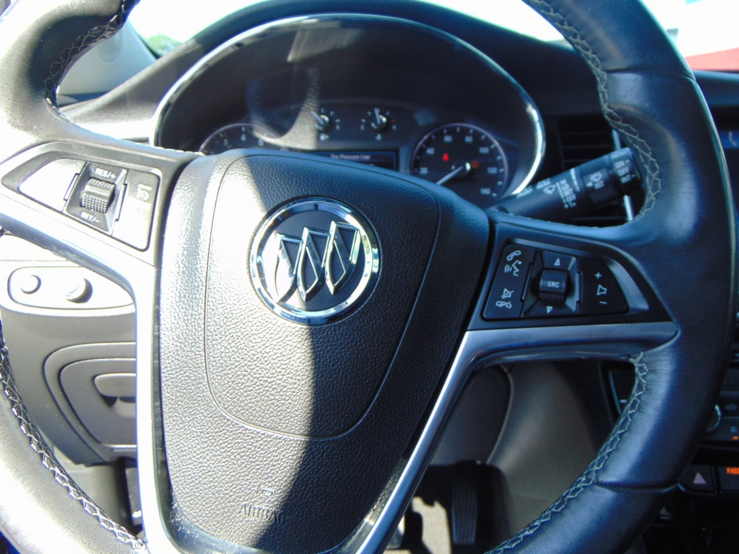 2017 Blue Buick Encore (KL4CJASB4HB) with an 4-Cyl, ECOTEC, 1.4T engine, Auto, 6-Spd OD ShftCtrl transmission, located at 2105 Dixie Hwy, Louisville, KY, 40210, (502) 772-3333, 38.220932, -85.795441- Photo#10
